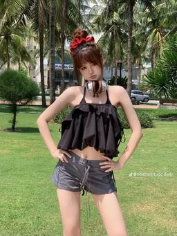 quần dù bơi dáng ôm ngắn cạp trễ nhabachtuoc
